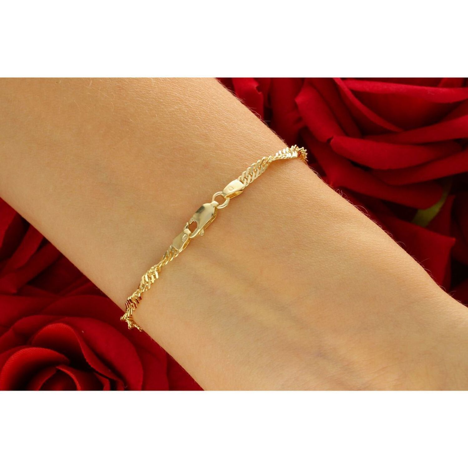 Elegancka złota bransoletka damska próby 585 w splocie Singapur, szerokość 3 mm. Długość 19 cm, waga 3,25 g, zapięcie na karabińczyk. Idealna do codziennych i eleganckich stylizacji.1.jpg